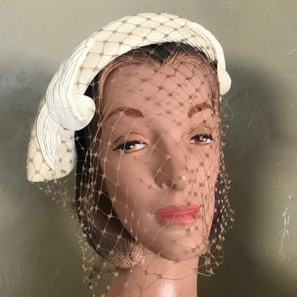 ELEGANT 1950s' CREAM COLOR STRAW ASYMMETRICAL TOQUE WITH BEADED APPLIQUÉS & VEIL